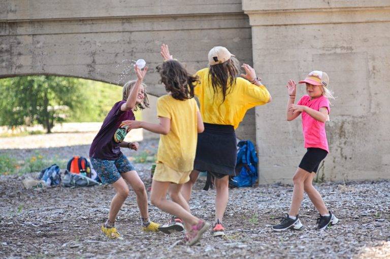 kids group walking outdoor nature trail