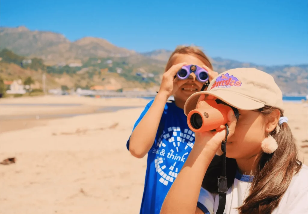 kids smiling outdoors hiking group