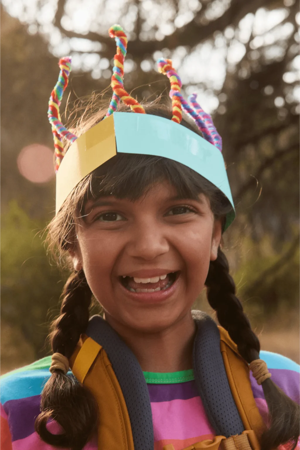 smiling child outdoors hiking adventure